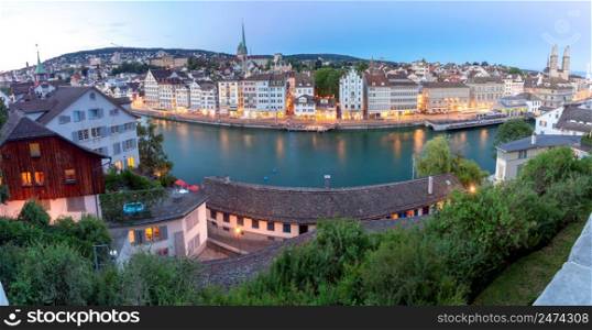 Scenic panoramic view of the city in the night view. Zurich. Switzerland.. Zurich. Panoramic aerial view of the city at sunset.