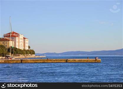 Scenic pier on the Adriatic Sea bay in Zadar, Croatia, lots of copy space composition