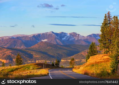 Scenic road in the mountains. Travel background.