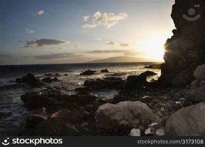 Scenic rocky coast during sunset in Maui Hawaii.