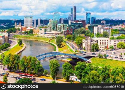 Scenic summer aerial view of modern business financial district architecture buildings and Old Town in Vilnius, Lithuania