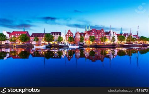 Scenic summer evening panorama view of the Old Town pier architecture in Lubeck, Germany