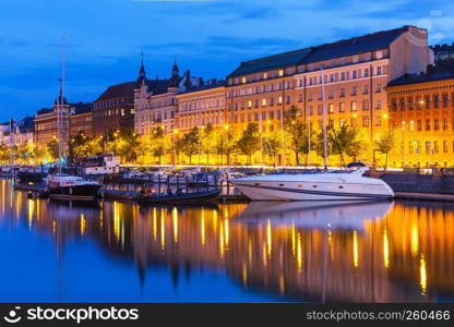 Scenic summer evening view of the Old Town pier with sailing yachts and ships in Helsinki, Finland