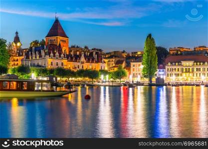 Scenic summer night view of the Old Town of Lausanne, Switzerland