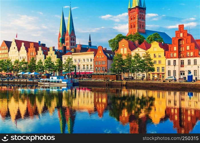Scenic summer sunset view of the Old Town pier architecture in Lubeck, Germany