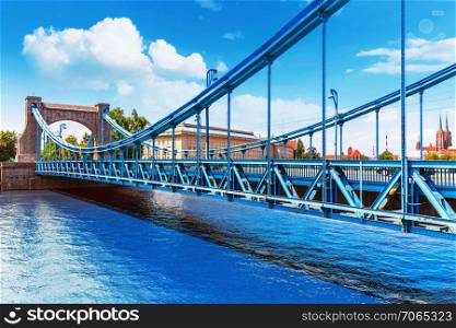 Scenic summer view of Grunwald Bridge over Oder river in the Old Town of Wroclaw, Poland