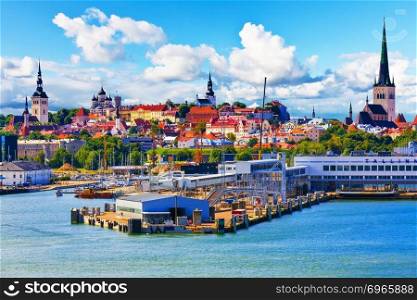Scenic summer view of the Old Town architecture and sea port harbor in Tallinn, Estonia