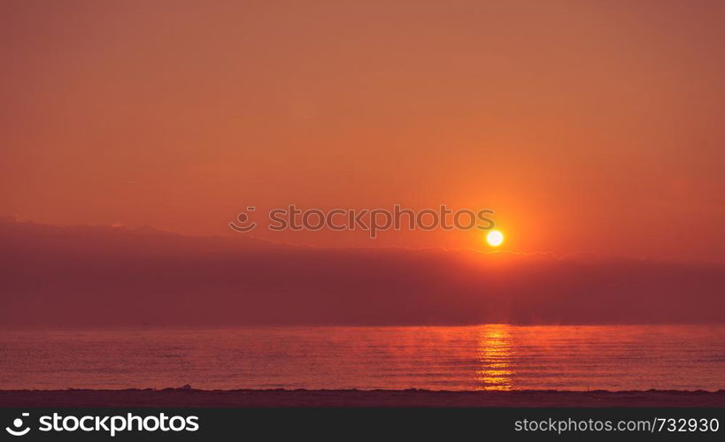 Scenic sunrise or sunset over sea surface, Greece. Sunrise or sunset over sea surface