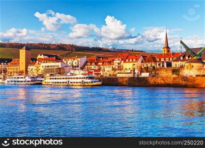 Scenic sunset evening view of old buildings at Main river pier and street architecture in the Old Town of Wurzburg, Bavaria, Germany