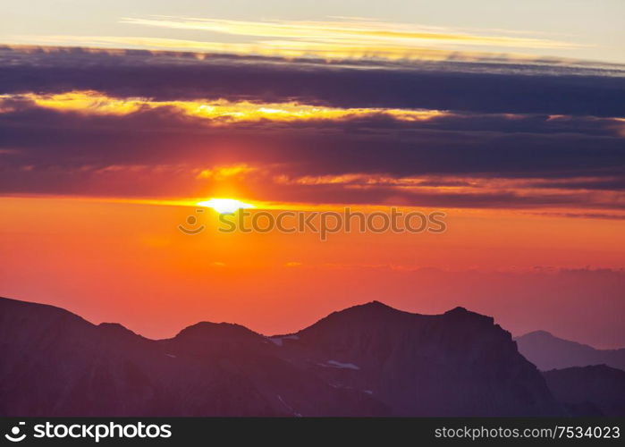 Scenic Sunset in the mountains. Autumn season.