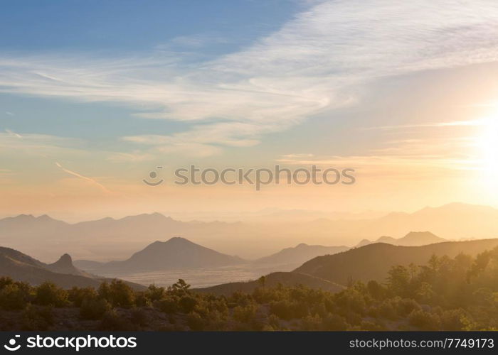 Scenic Sunset in the mountains. Beautiful natural background.