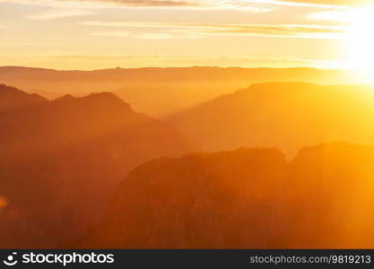 Scenic Sunset in the mountains. Beautiful natural background.