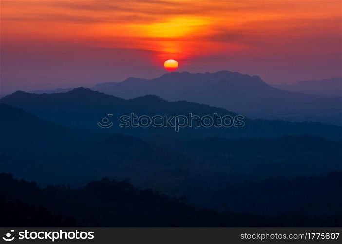 Scenic Sunset Landscape, Sun over Mountain at Mae Moh Lampang in thailand.. Sunset Landscape.