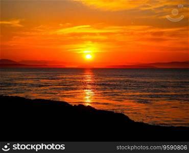 Scenic sunset over ocean, San Juan Islands Washington state.