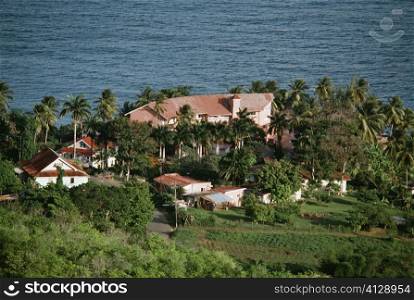 Scenic view of a resort amidst palm trees, Tobago, Caribbean