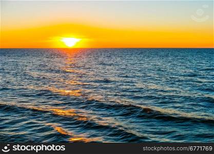 Scenic view of bright sunset over the sea