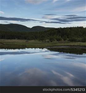 Scenic view of calm river in forest, Cheticamp, Cabot Trail, Cape Breton Island, Nova Scotia, Canada