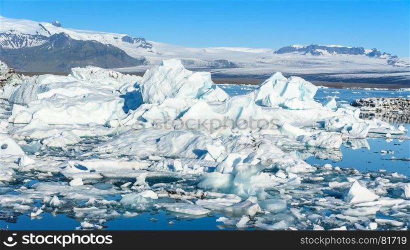 Scenic view of icebergs in Jokulsarlon glacier lagoon, Iceland, selective focus
