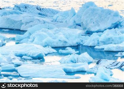 Scenic view of icebergs in Jokulsarlon glacier lagoon, Iceland, selective focus, global warming concept