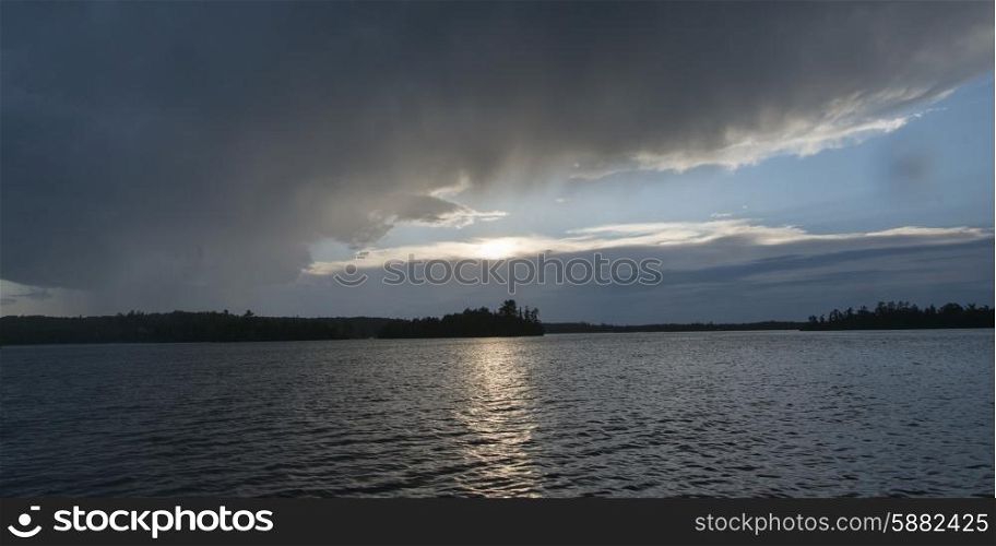Scenic view of lake at sunrise, Lake of the Woods, Ontario, Canada