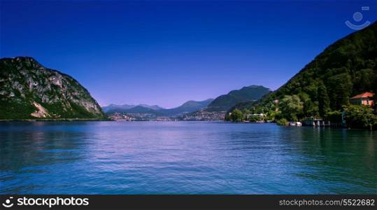 Scenic view of Lugano city shoreline and lake, Ticino, Switzerland.