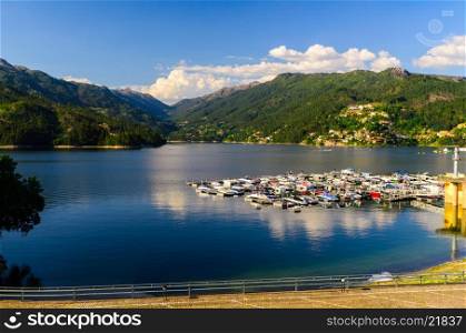 scenic view of marina at Cavado river and Peneda-Geres National Park in northern Portugal.