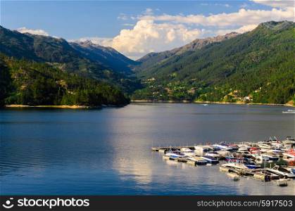 scenic view of marina at Cavado river and Peneda-Geres National Park in northern Portugal.. Peneda-Geres National Park