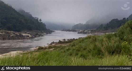 Scenic view of river flowing through mountains, River Mekong, Laos