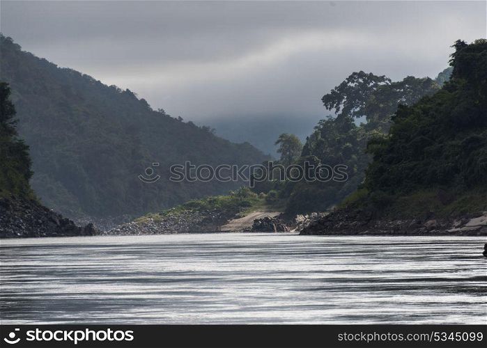 Scenic view of river flowing through mountains, River Mekong, Oudomxay Province, Laos