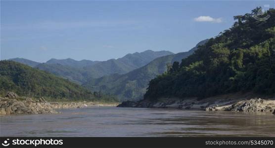 Scenic view of river with mountain range in background, River Mekong, Sainyabuli Province, Laos