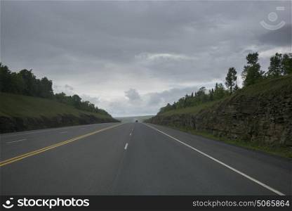 Scenic view of road passing through landscape, Fredericton, New Brunswick, Canada
