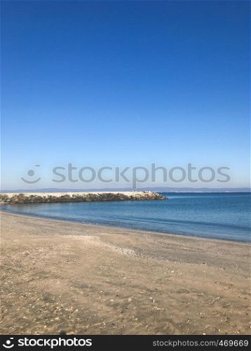Scenic View Of Sea Against Clear Blue Sky and Sunlight