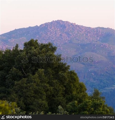 scenic view of sunset mountains at Peneda-Geres National Park in northern Portugal.