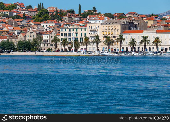 Scenic view of the city promenade and harbor on a sunny day. Split Croatia.. Split. City embankment on a sunny day.