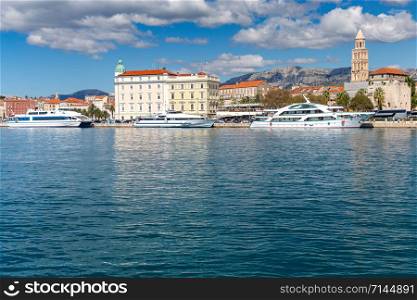 Scenic view of the city promenade and harbor on a sunny day. Split Croatia.. Split. City embankment on a sunny day.