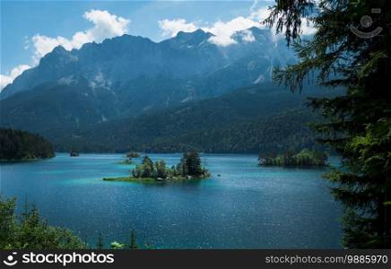 Scenic view of the Eibsee in Bavaria and the Zugspitze with blue sky