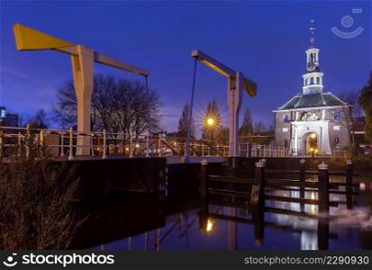 Scenic view of the gates of the old town Zailport at dawn. Leiden. Netherlands.. The old city gate Zijlpoort in Leiden at sunrise.