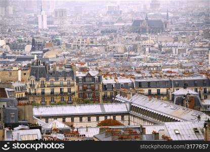 Scenic view on Paris rooftops and cathedrals