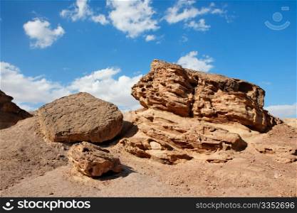 Scenic weathered orange rock in stone desert