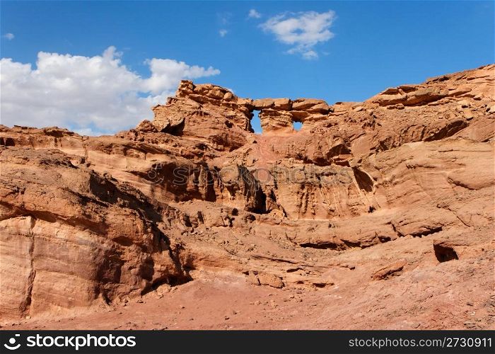 Scenic weathered rock in stone desert