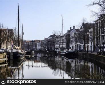 Schiedam,Holland,22-march-2022: Historical drawbridge across a canal and in Schiedam, Holland, Schiedam is famous for its genever. a vridge over a canal in the village Schiedam in Holland