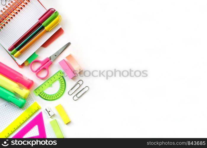 School and Office drawing supplies isolated on white background. Free space for text. Back to school. Top view border of colour pens, markers, rulers and note. School and Office drawing supplies isolated on white background. Back to school. Free space for text.