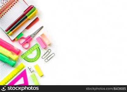 School and Office drawing supplies isolated on white background. Free space for text. Back to school. Top view border of colour pens, markers, rulers and note. School and Office drawing supplies isolated on white background. Back to school. Free space for text.