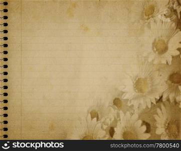 school book. image of an old book of lined paper with floral design