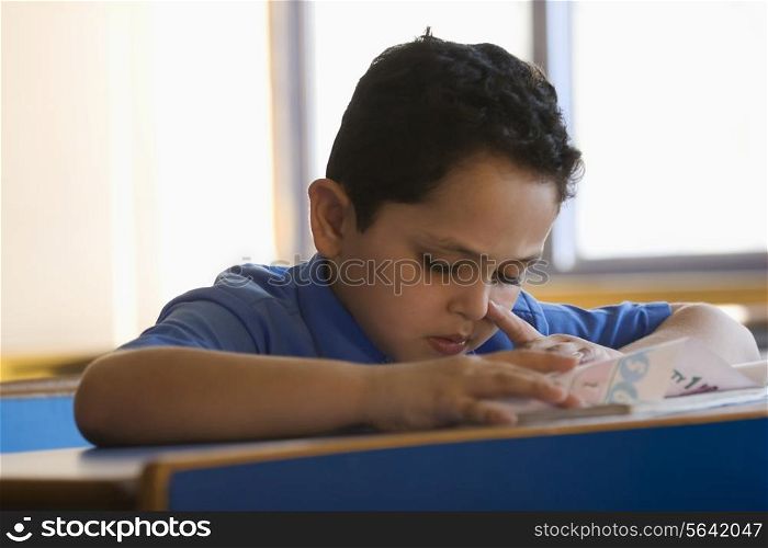 School boy at his desk