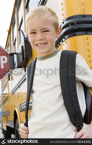 School Boy by School Bus