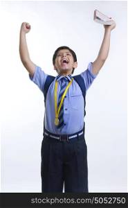 School boy rejoicing