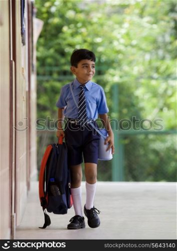 School boy with a school bag