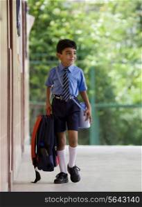 School boy with a school bag