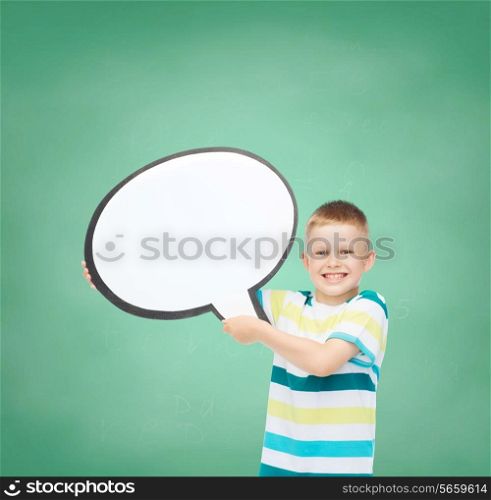 school, childhood, conversation, education and people concept - smiling little boy with blank text bubble green board background